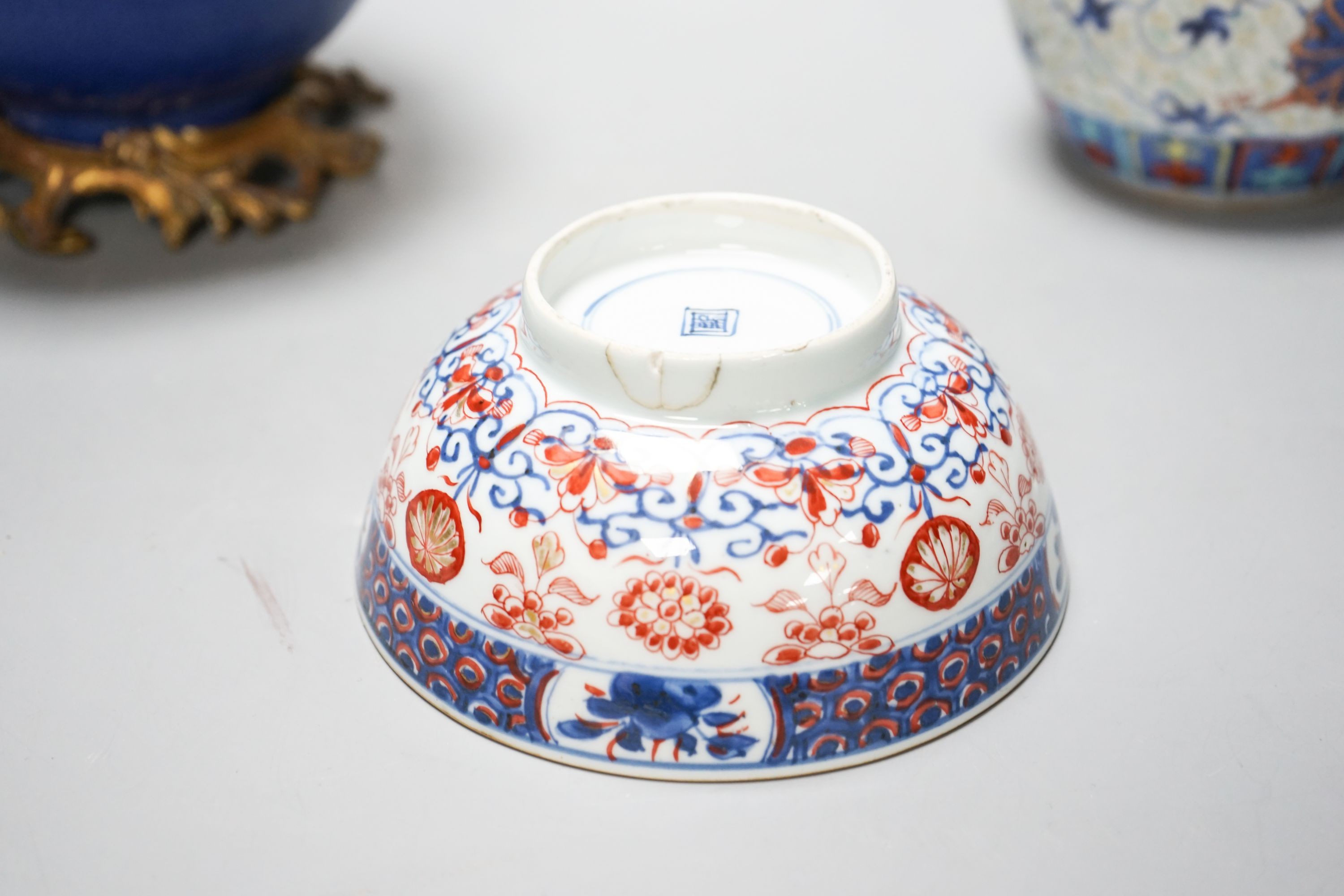 An 18th century Chinese clobbered blue and white bowl, a Samson powder blue ormolu mounted bowl, 19.5cm wide and a 19th century Chinese doucai style jar